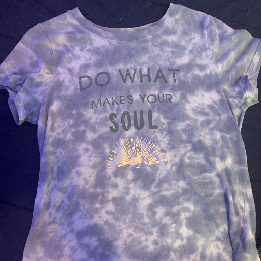 A medium grey short sleeve tie dye shirt.